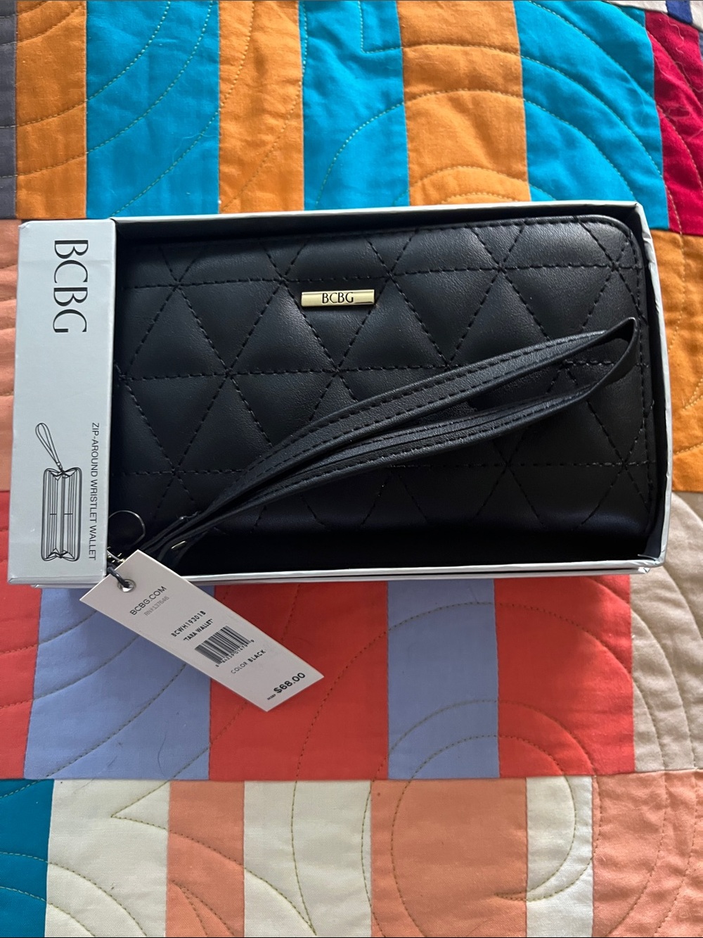 BCBG Quilted Black Wristlet Clutch with Gold Plaque